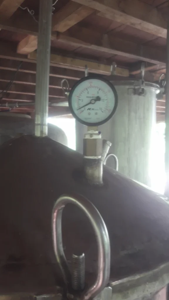 Essential oil extraction equipment used to process Cambodian botanicals at Herbal Kulen.