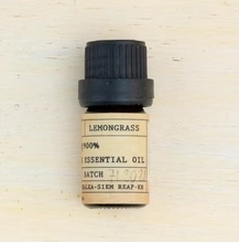Small bottle of Herbal Kulen 100% lemongrass essential oil produced in Cambodia.