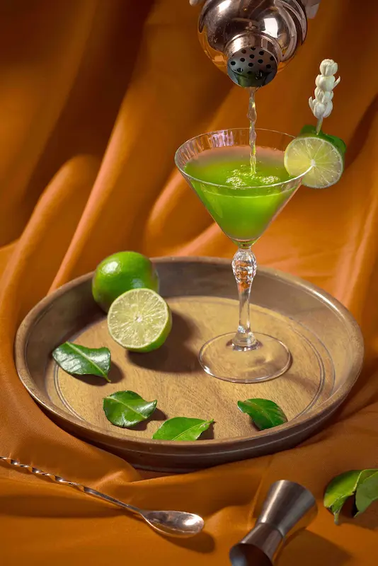 Green Sex in the Garden cocktail with Herbal Kulen gin, lime and tropical botanicals.